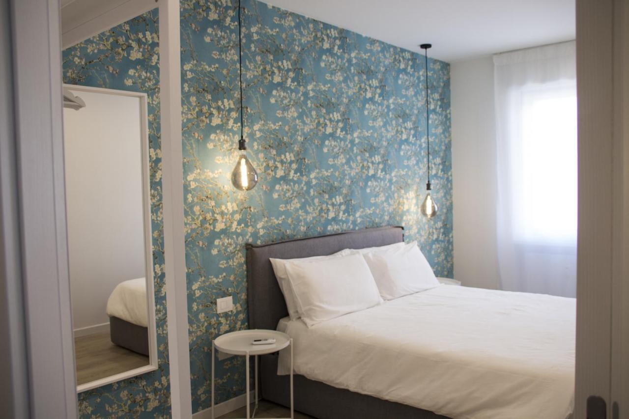 Bloom Apartments Trento Bagian luar foto